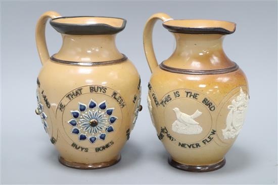 Two Doulton Lambeth motto jugs, c.1884, one titled He that buys land buys stone ..., the second This is the tree that never grew...